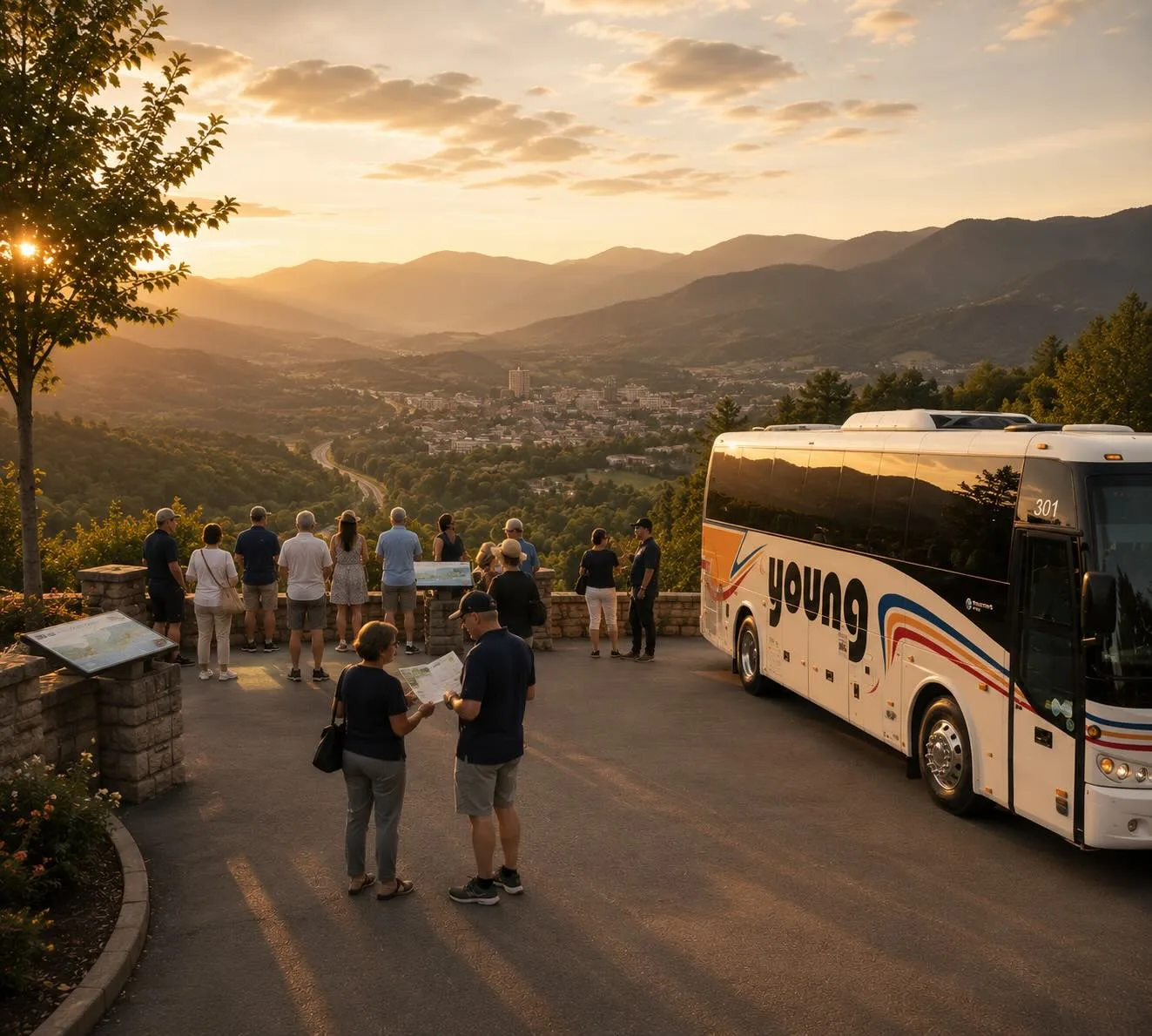 Tour group at a mountain overlook at sunset beside a Young Transportation motorcoach